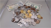 Jar Of Various Coins And Bills