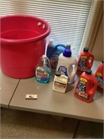 Large bucket of cleaning supplies