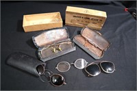 Lot of old eye glasses and lenses