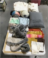 Linen lot w/ clothes, curtains, & elephant hat