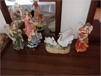 4 figurines angels Swan tallest is 16 inches.