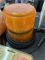 Orange light plugs into cigarette lighter