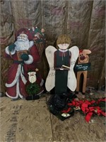 Assortment of Christmas decor including wooden