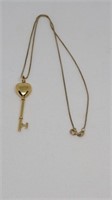 Sterling gold tone chain and heart key locket