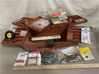 Trophy tackle box with lures, hooks, bait, oil,
