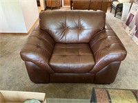 Brown leather tufted chair