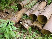 APP. 10 SECTIONS OF PIPE CASING & TANK  IN WEEDS