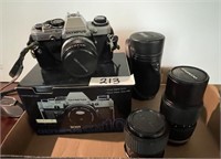Olympus OM10 with box and 2 extra lenses