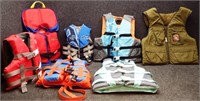 (6) Childs Life Jackets & (1) Adult
