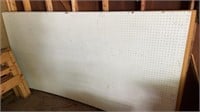 7) sheets of Peg board & a plywood sheet