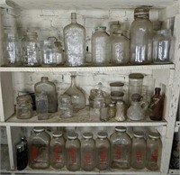 Three Shelves Of Jars & Bottles