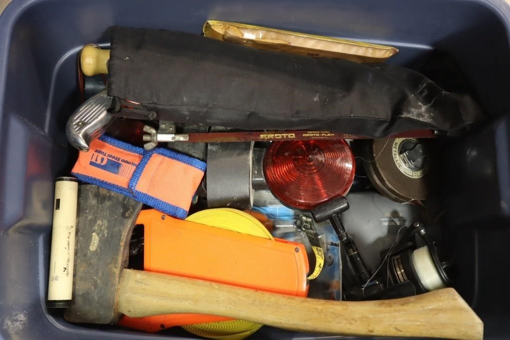 Tote of tools including tape measure, hatchet,