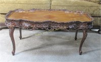 Ornate Carved Coffee Table With Inlaid Top