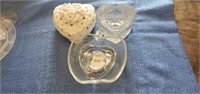Assorted glass hearts, and apple