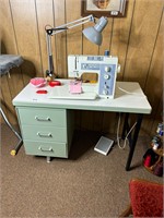 Sewing table with Sewing Machine and Contents