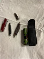 Assorted knives and flashlight