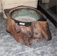 Very early natural timber log form container