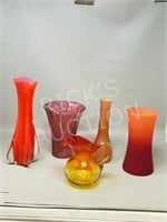 assorted colored glass vases
