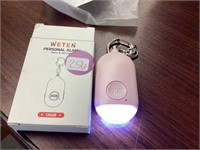 Personal alarm and LED light