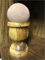 Clay decorative ball with vintage wooden holder