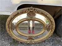ORNATE OVAL SECTIONED MIRROR