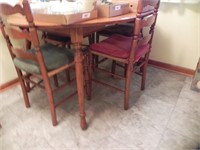 Table and 4 Ladderback Chairs with Cane Seats