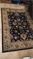 Rug 89 inches long 62 inches wide