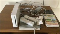 Wii with remotes and games