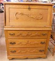 Oak drop front secretary desk w/ 3 drawers,