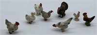 8 mostly compostion poultry figures