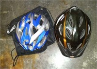 Two bicycle helmets