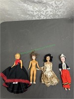 4 dolls: 2 World Souvenier other 2 no