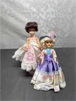 Vtg World doll and plastic doll pink dress