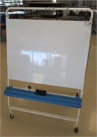 Rolling dry erase white board. Measures 57" H x