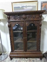 ORNATELY CARVED 2 DOOR GLASS FRONT BOOKCASE