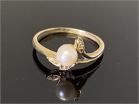 14K ring with small pearl.