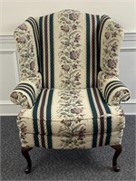 Floral wingback Queen Anne style chair