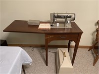 Signature cabinet sewing machine