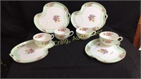 Noritake set of (4) luncheon places with cups.