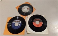 Three 7" Records Incl. John Cougar