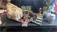 Sewing kit, vases, baby carriage, light house,