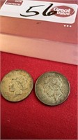 1926 and a 1934 silver dollars