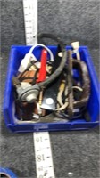 assortment of hoses and tools