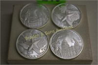 GROUP OF 4 ONE OUNCE SILVER ROUNDS