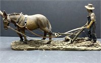 Resin plowing mule figure