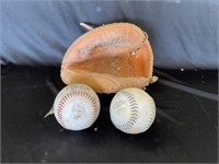Dunzi baseball glove and softballs
