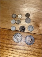 2 half dollars, 5 dimes and 2 nickels