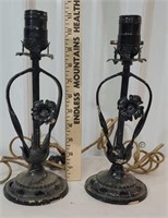 Pair of cast iron base lamps with original cloth