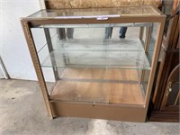 Wood display cabinet with glass shelves