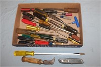Assortment of screwdrivers, exacto knife, etc.